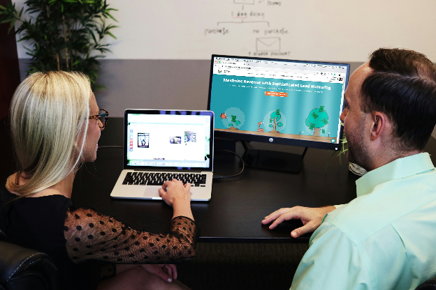 Small business team using HubSpot Free on multiple devices